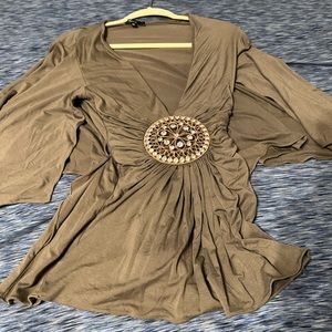 Olive colored Sky top with crystal medallion.